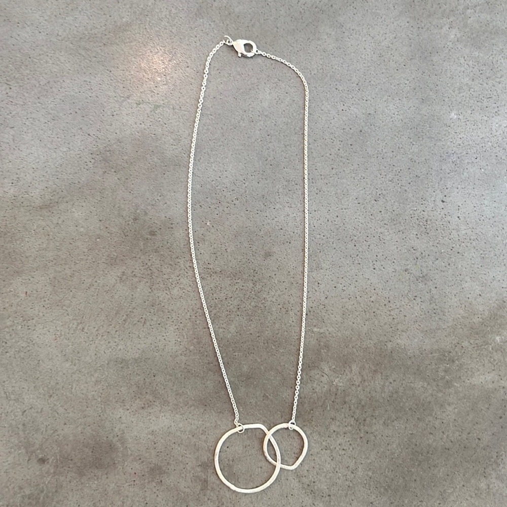 Silver tone double circle necklace